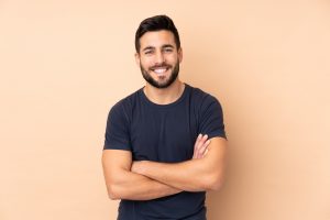 man happy to show off his healthy smile